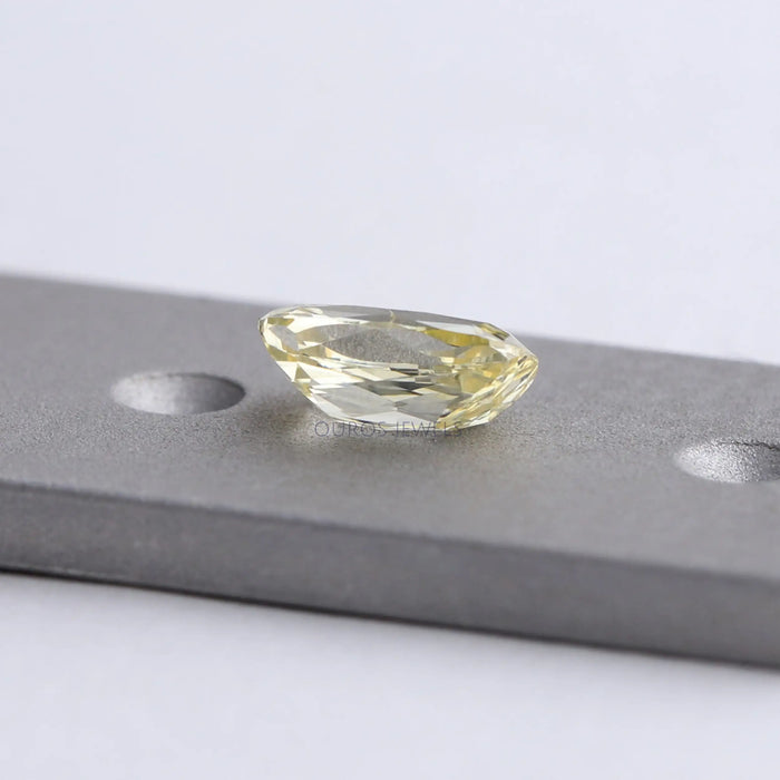 back view of vivid yellow old mine diamond elongated cushion cut