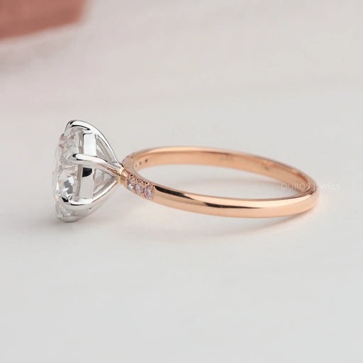 side view of rose-cut round diamond solitaire accent ring with rose gold band