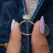 close view of rose-cut round diamond solitaire accent ring with rose gold band