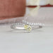 Pear shaped diamond wedding anniversary ring with yellow pear shaped eco-friendly diamond